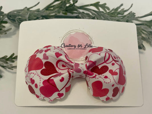 Rounded Bowtie Hair Bow with Scalloped Edges - Red Hearts