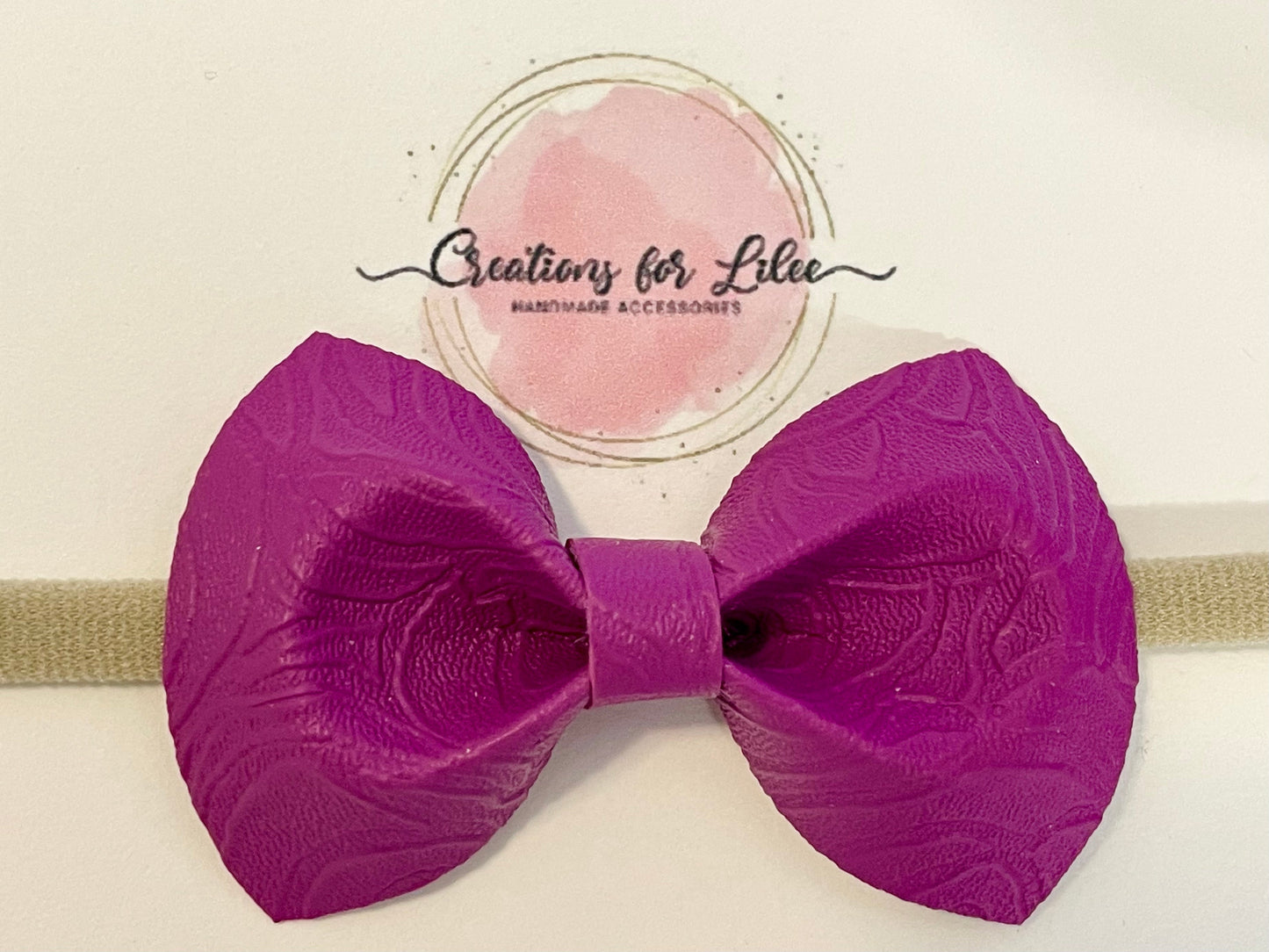 Nylon Headband with Leatherette Bow - Embossed Purple